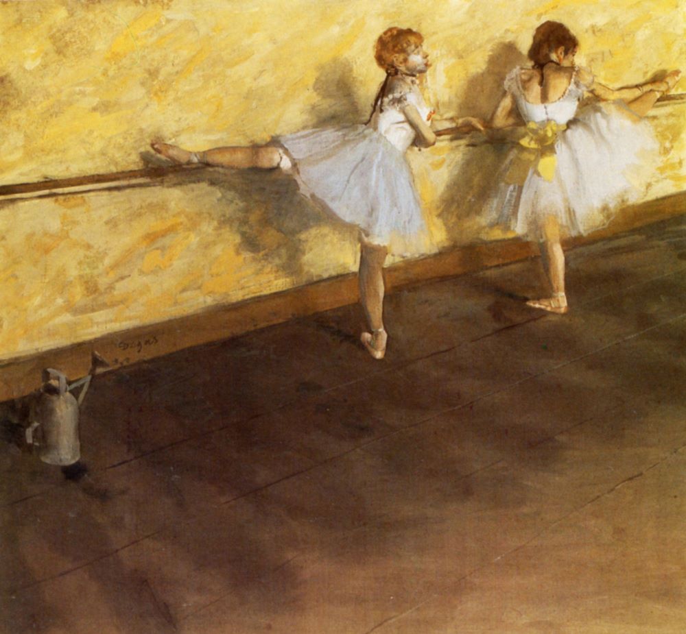 A ballerina holding the barre